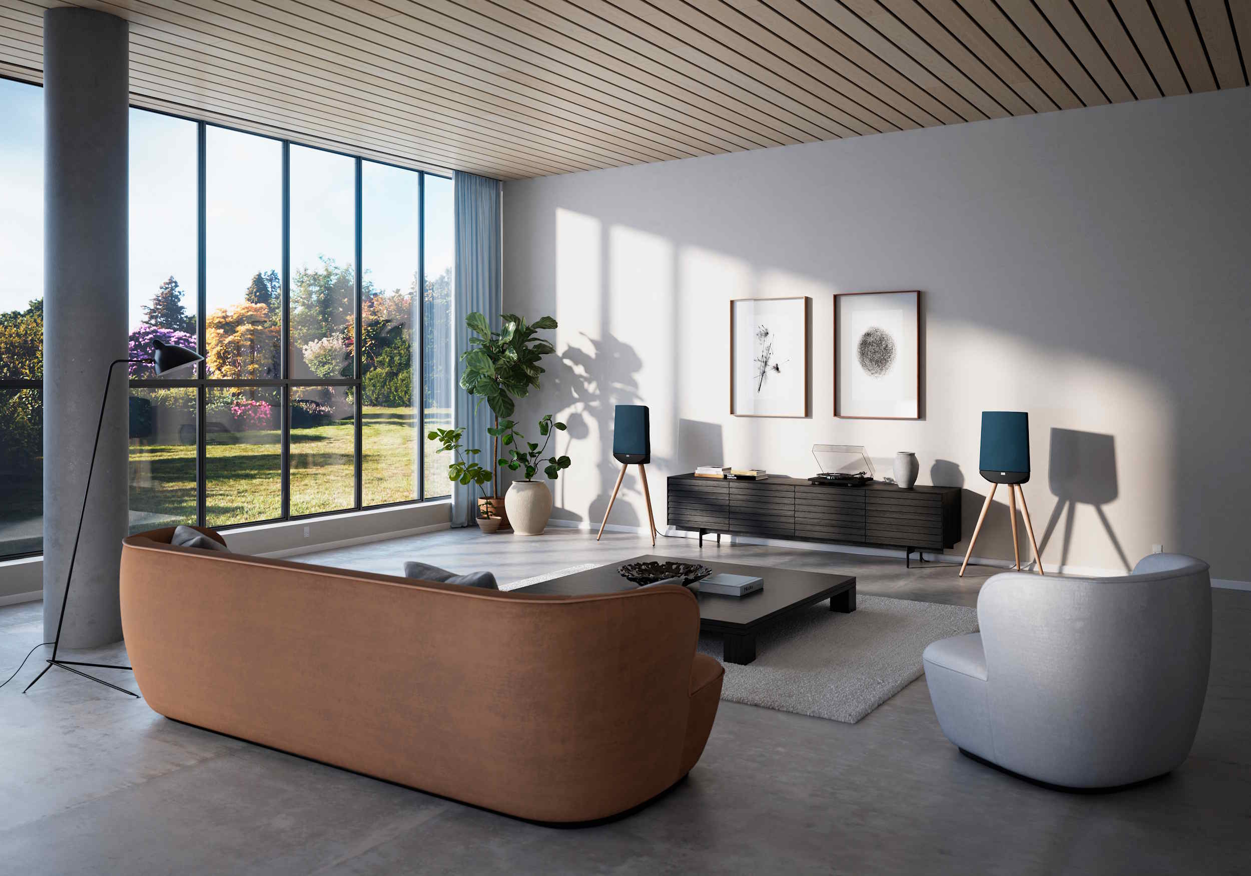 Modern living room with a turntable and freestanding wireless speakers