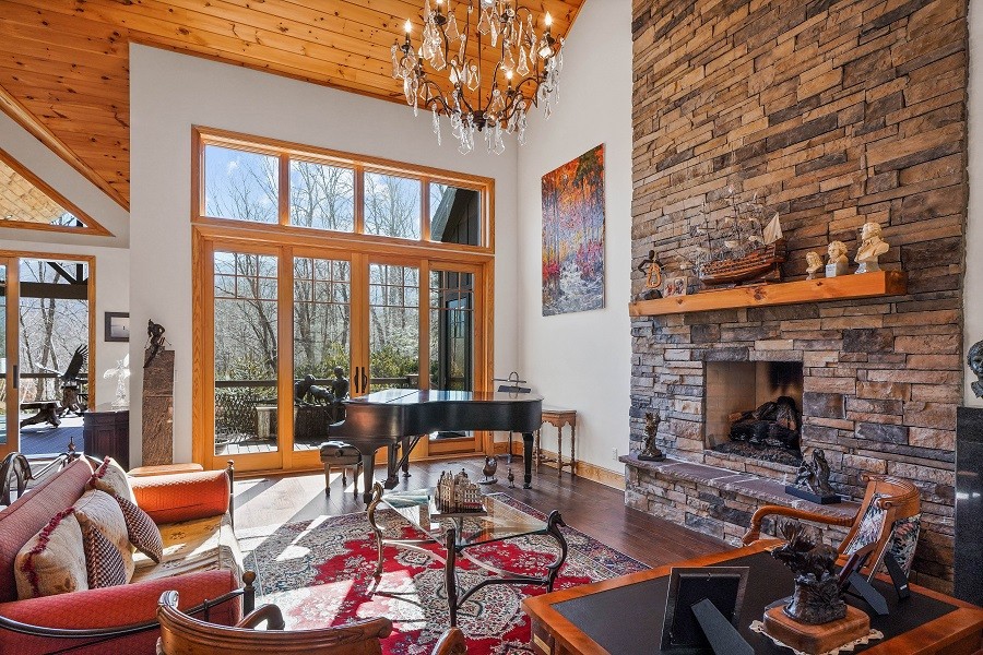 Sophisticated and elegant living room with modern rustic elements that almost shimmer with the light. 