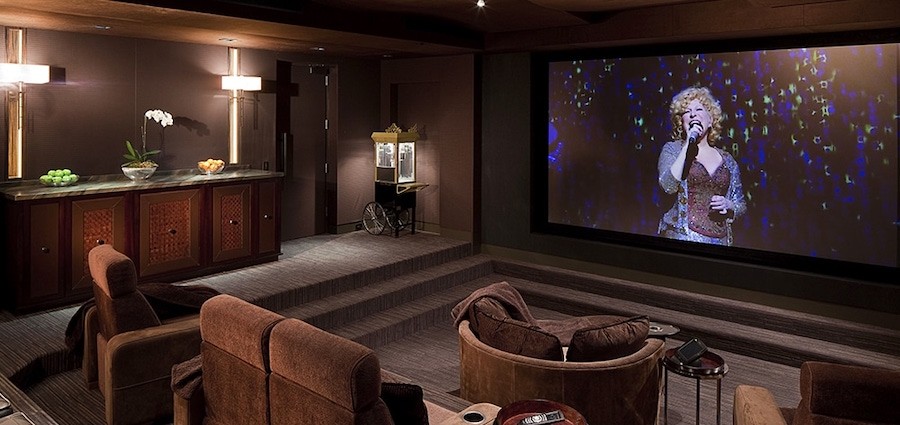 A Boulder, CO luxury home theater designed with Steinway Lyngdorf speakers. 