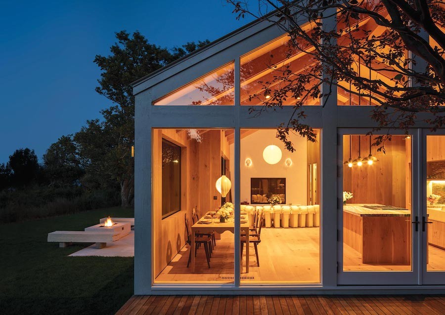 A nighttime view into a Colorado Springs home with the soft, warm glow of Ketra tunable lighting control. 