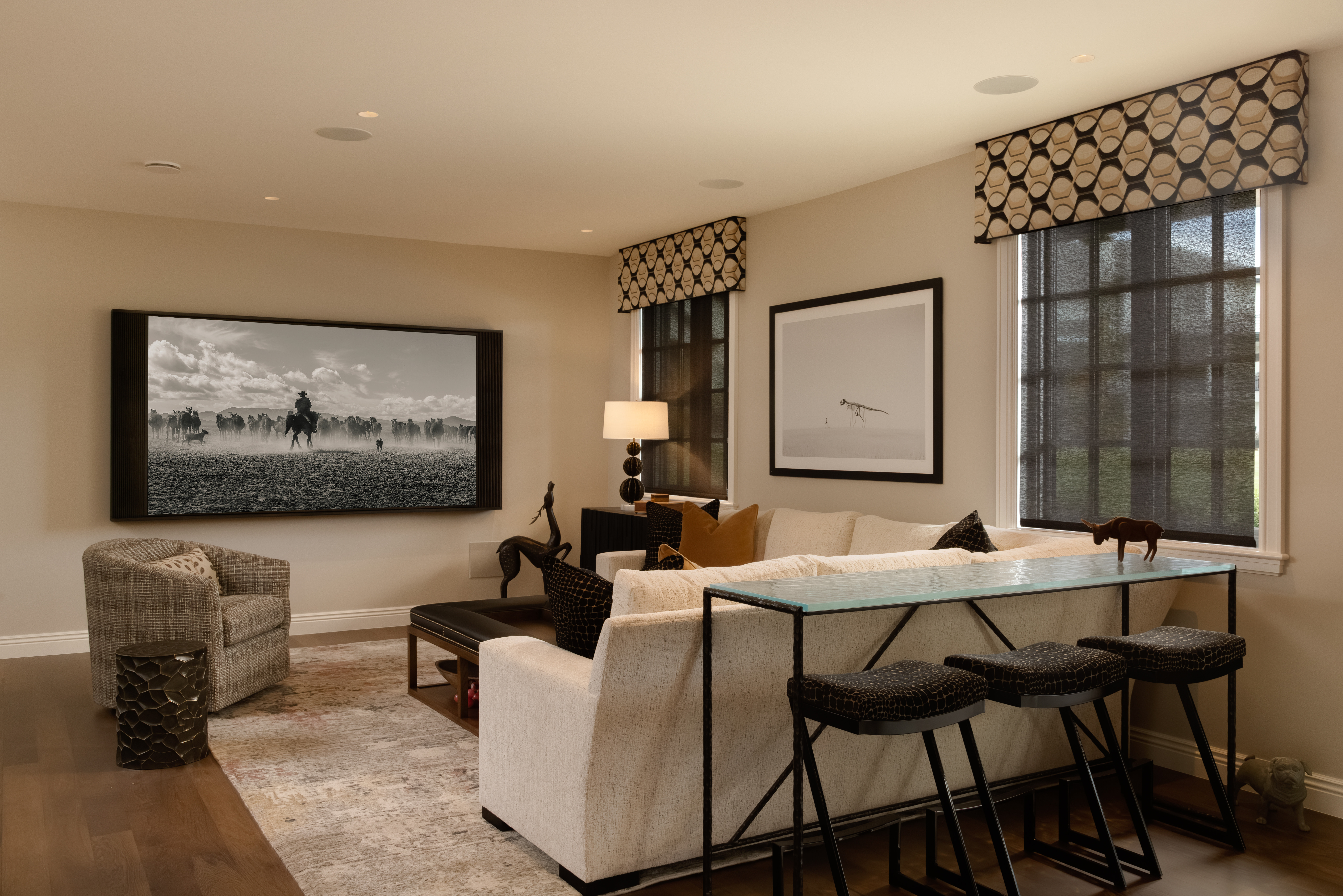 Living room featuring artwork TV installation