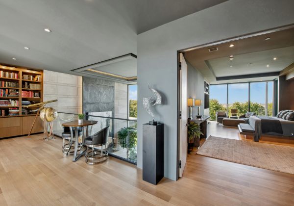 Evenly lit living and work space with large windows
